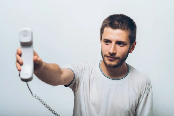 Человек Разговаривает Стационарному Телефону — стоковое фото