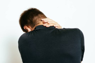 Boyun ağrısı. Arkadaki adam