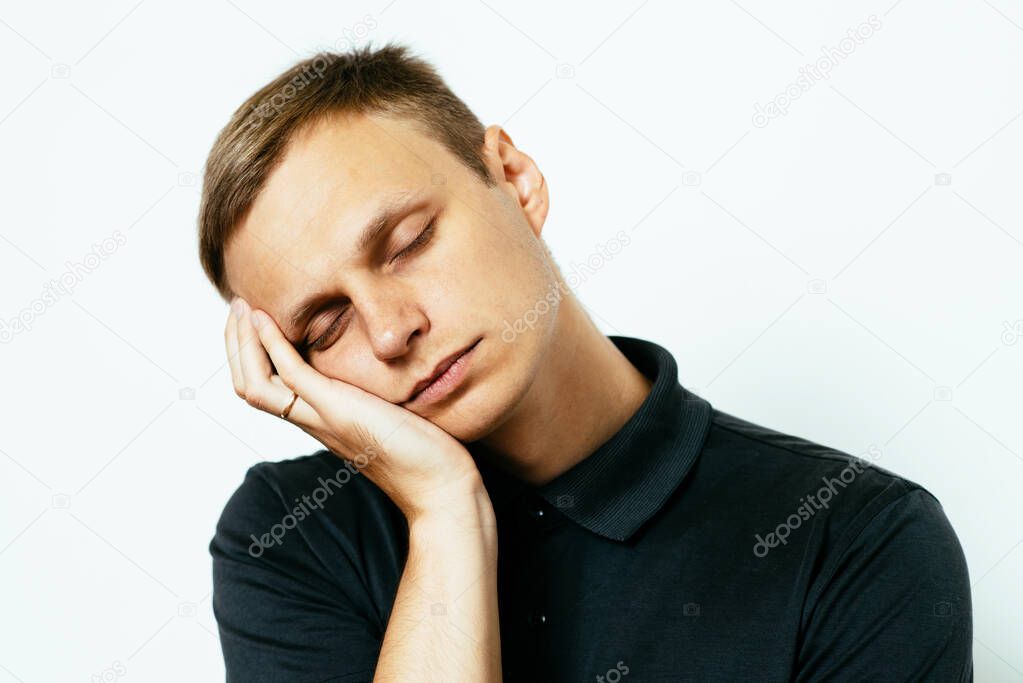 Sleep. Man in photo studio