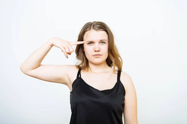 Vrouw Met Vinger Buurt Van Haar Slaap — Stockfoto