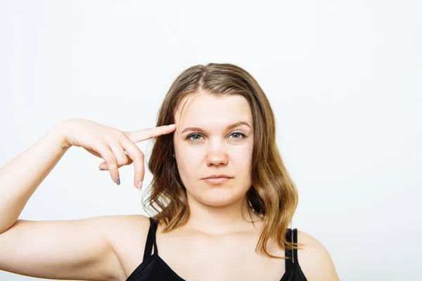 Vrouw Met Vinger Buurt Van Haar Slaap — Stockfoto