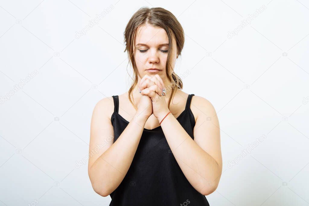 Prayer. Female. in photo studio
