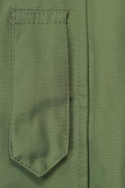 Zeytin yeşili yeşil Ecwcs Parka rütbe nişanlar rozet döngü Closeup, boş boş dikey giyim arka plan boşluk, açık Placket fırtına kapak, büyük ayrıntılı Makro kopyalama