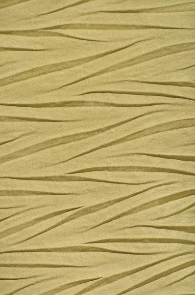 Textile synthétique froissé doré jaune, Détail de tissu de polyester plissé, Modèle de texture ridée décorative verticale, Grand fond de montre texturé détaillé lumineux, Doux Bokeh Accent — Photo