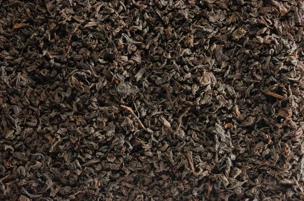 Dark Loose Leaf Tea Sfondo, Black Golden Leaves Blend Texture Pattern Closeup Dettaglio, orizzontale grande dettaglio strutturato Macro Wallpaper — Foto Stock