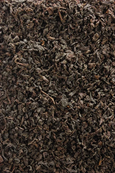 Fondo de té de hoja suelta oscura, Patrón de textura de mezcla de hojas de oro negro Detalle de primer plano, Fondo de pantalla de macro texturizado detallado vertical grande — Foto de Stock