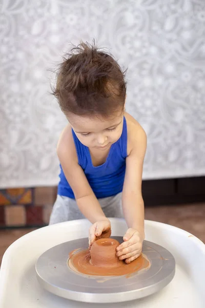 Boy potter at work — Stock Photo, Image