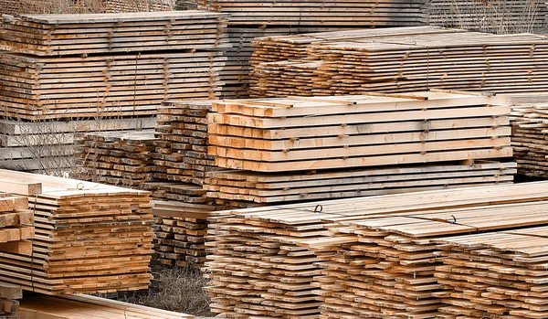 Stacked wood spruce and pine timber for construction buildings — Stock Photo, Image