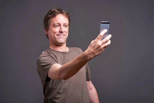 Man with a smartphone — Stock Photo, Image