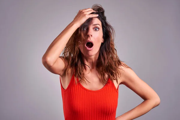 Surprised young woman — Stock Photo, Image