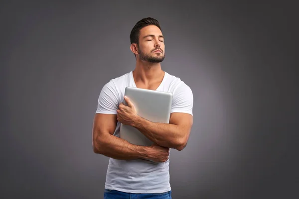 Young man with laptop — Stock Photo, Image