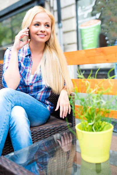 A beautiful young woman on the terrace — Stock Photo, Image