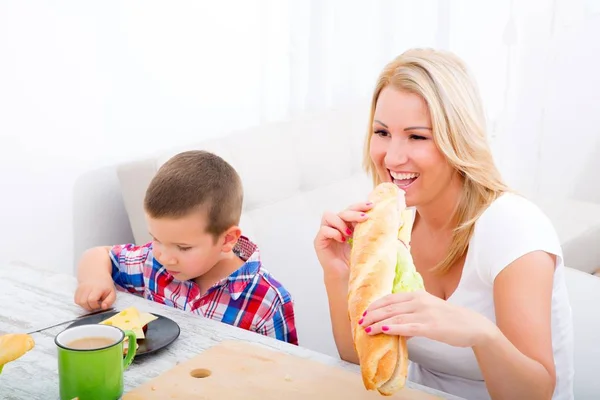 Mother and Son having breakfast at home — Stock Photo, Image