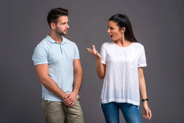 Nice young couple in the studio — Stock Photo, Image