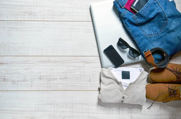 View of a tabletop with clothes — Stock Photo, Image