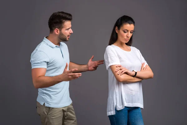 Nice young couple in the studio — Stock Photo, Image