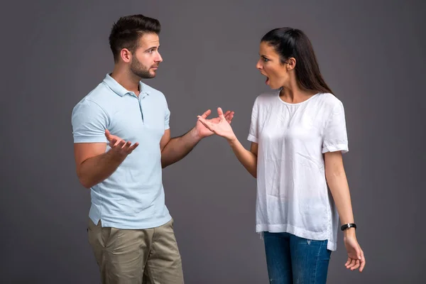 Nice young couple in the studio — Stock Photo, Image