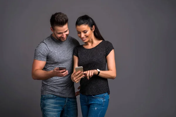 Nice young couple in the studio — Stock Photo, Image