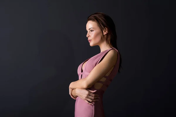 Portrait of a beautiful woman in a elegant dress — Stock Photo, Image