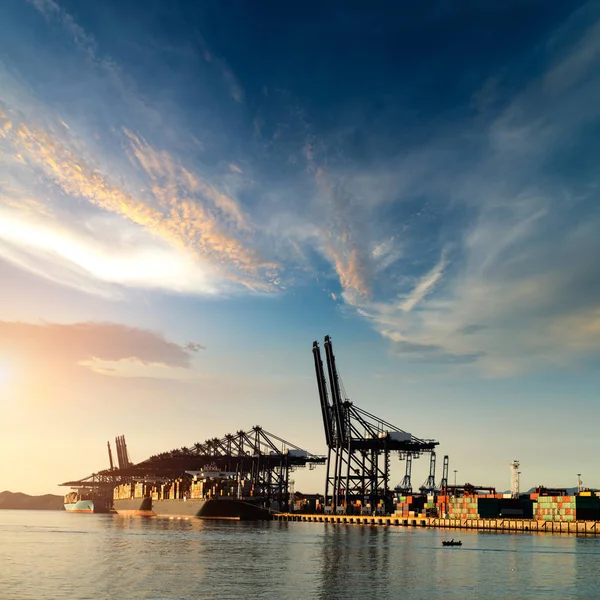 Container terminal, viewed from the water, on a clear blue day. — Stock Photo, Image