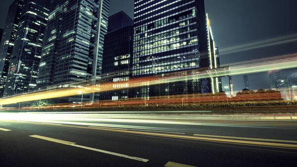 The light trails on the modern building background