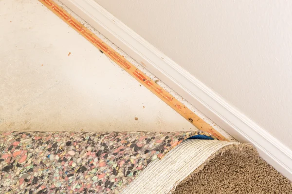 Pulled Back Carpet and Padding In Room — Stock Photo, Image