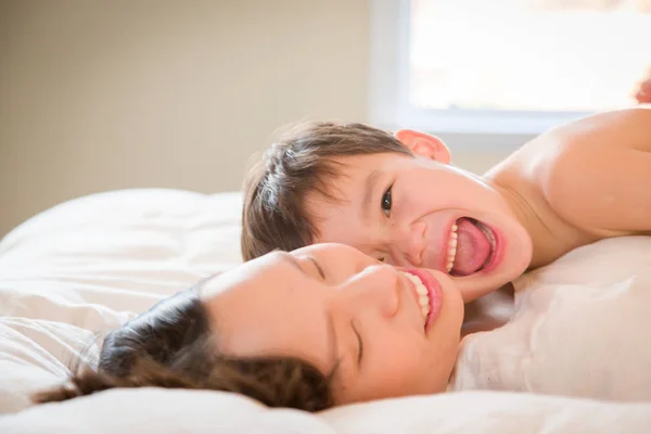 Mixed Race Chinese and Caucasian Boy Laying In His Bed with His — Stock Photo, Image