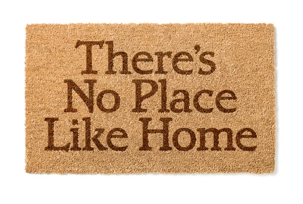 No hay lugar como el hogar alfombra de bienvenida en blanco —  Fotos de Stock