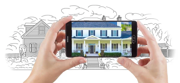 Mãos segurando telefone inteligente exibindo Home Foto de desenho por trás — Fotografia de Stock