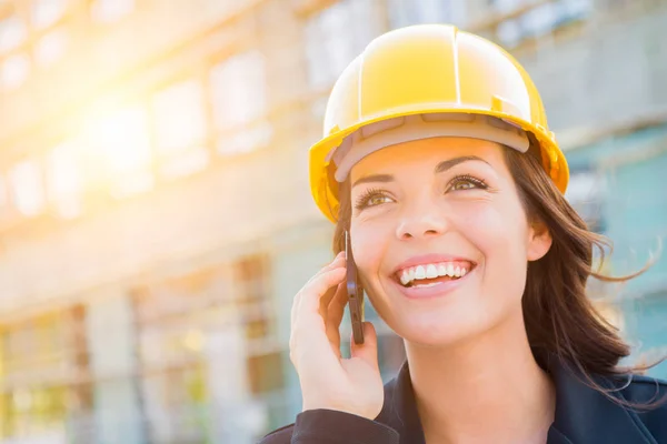 Young Female Contractor Wearing Hard Hat on Site Using Phone — Stock Photo, Image
