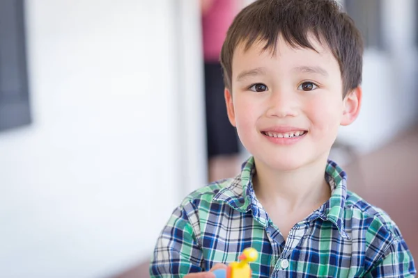 Portrait of Mixed Race Chinese and Caucasian Young Boy With Toy — Stock Photo, Image