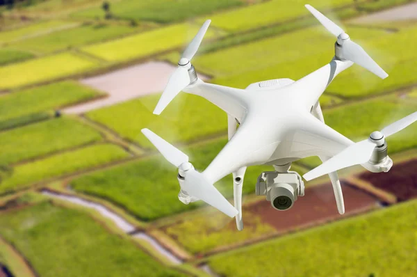 Unmanned Aircraft System (UAV) Quadcopter Drone In The Air Over Hanalei Valley and Taro Farm Fields on Kauai, Hawaii. — Stock Photo, Image