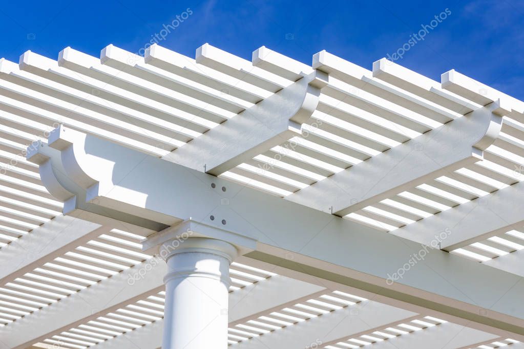 Beautiful House Patio Cover Against the Blue Sky.