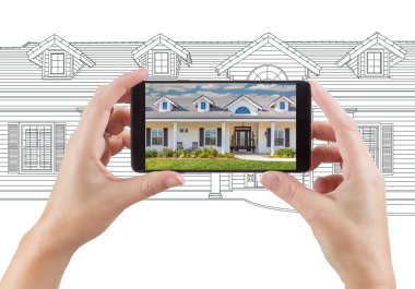 Akıllı Holding eller çizim arkasında evde fotoğraf görüntüleme telefon