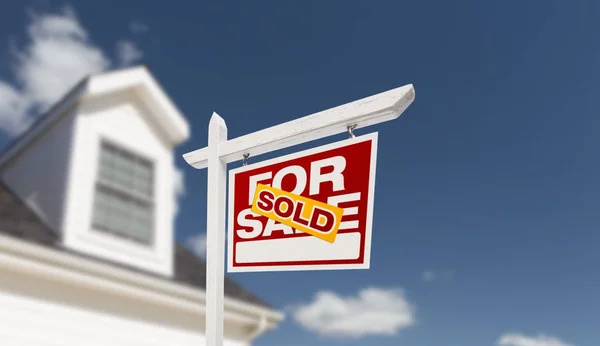Sold Home For Sale Real Estate Sign in Front of Beautiful New Ho — Stock Photo, Image
