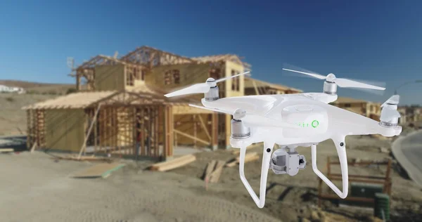 Unmanned Aircraft System (UAV) Quadcopter Drone In The Air Over Construction Site. — Stock Photo, Image