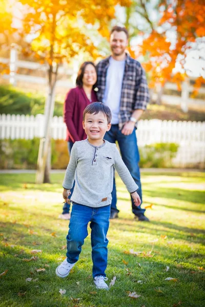 Outdoor Portrait of Happy Mixed Race Chinese and Caucasian Parents and Child. — Stock Photo, Image