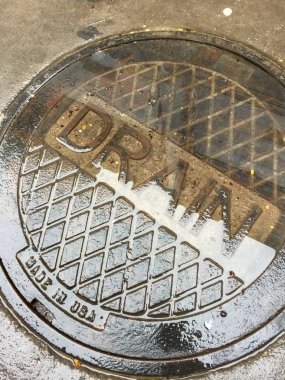 Industrial Wet Street Drain Cover clipart