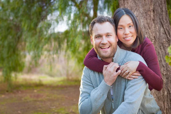 Mixed Race Caucasian and Chinese Couple Portrait Outdoors. — Stock Photo, Image