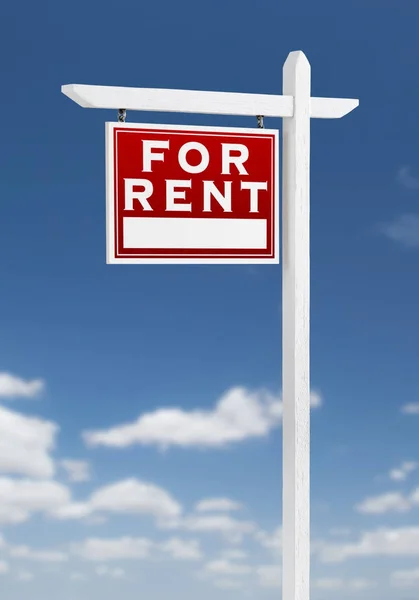 Left Facing For Rent Real Estate Sign on a Blue Sky with Clouds. — Stock Photo, Image