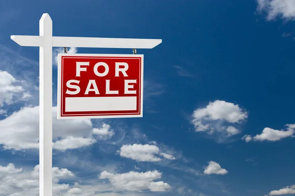 Right Facing For Sale Real Estate Sign Over Blue Sky and Clouds With Room For Your Text. — Stock Photo, Image