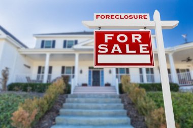 Left Facing Foreclosure For Sale Real Estate Sign in Front of House. clipart