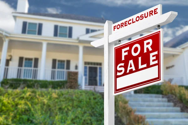 Right Facing Foreclosure For Sale Real Estate Sign in Front of House. — Stock Photo, Image