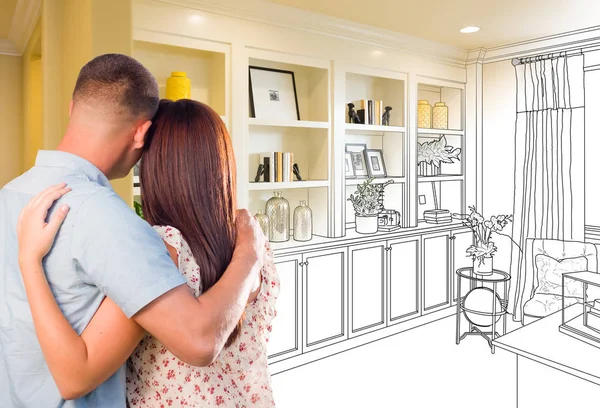 Young Military Couple Facing Custom Built-in Shelves and Cabinets Design Drawing Gradating to Finished Photo. — Stock Photo, Image