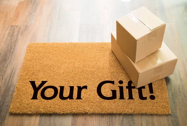 Your Gift Welcome Mat On Wood Floor With Shipment of Boxes — Stock Photo, Image