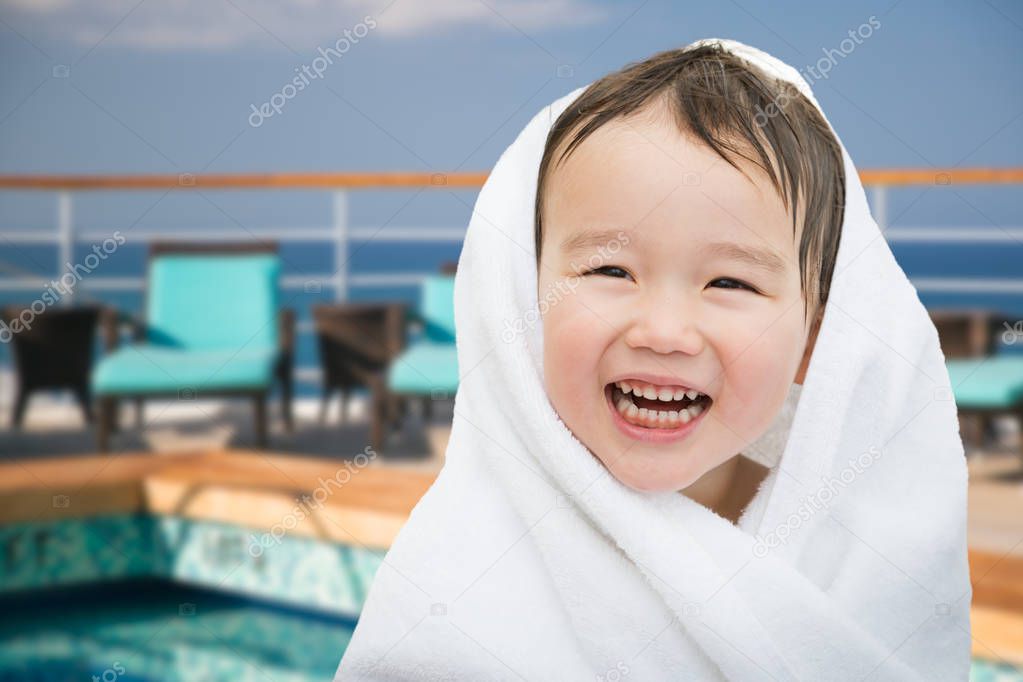 Happy Cute Mixed Race Chinese and Caucasian Boy On Cruise Ship W