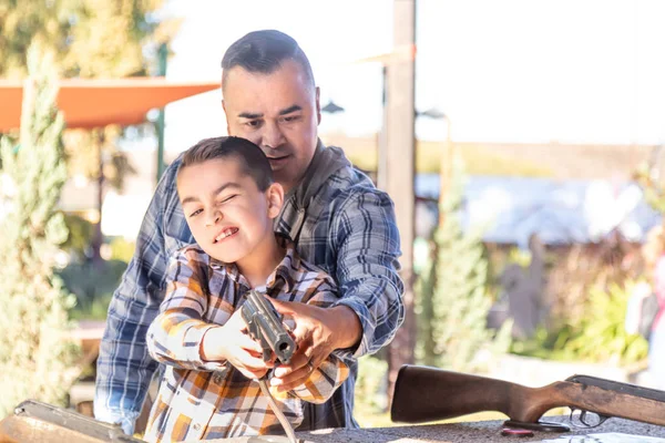 Mixed Race Father And Son At Fairground Shooting Range — Stock Photo, Image