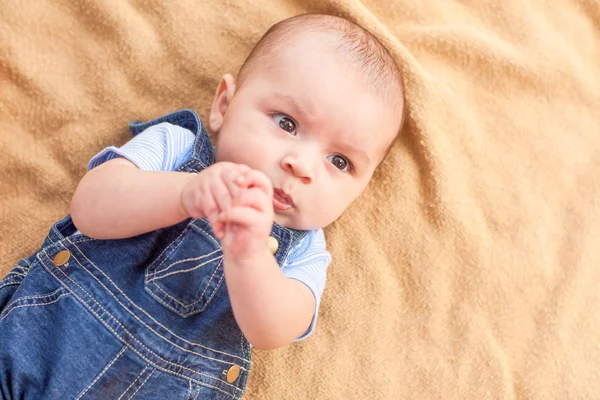 Happy Mixed Race Baby Boy Laying on Blanket — Stock Photo, Image