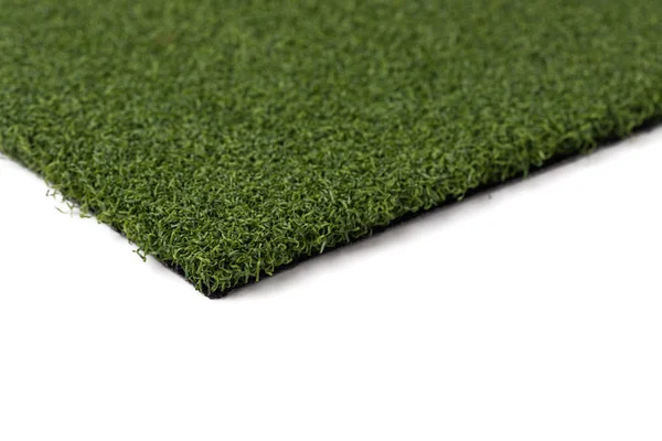 Sección de césped artificial hierba sobre fondo blanco —  Fotos de Stock