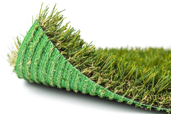 Flipped Up Section of Artificial Turf Grass On White Background — 스톡 사진